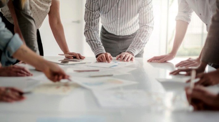 low-angle-view-of-hands-of-multiracial-group-of-people-working-with-ideas-and-brainstorming.jpg_s1024x1024wisk20cwEQ6Z6bnXTyhBPyy0qs3-h1zKFjrzfVDS0ktl3u_7Io – copie